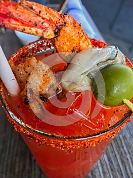 Bloody Mary cocktail with garnishes