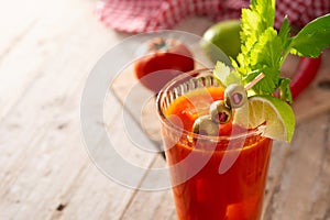 Bloody Mary cocktail in glass and ingredients