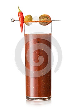 Bloody mary cocktail mix with black pepper and celery on white background with onion and olive