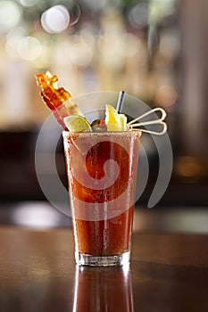 Bloody Mary on wood bar countertop photo