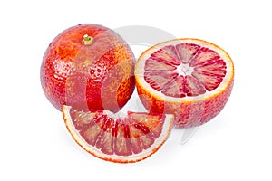 Bloody oranges whole and and cut in half isolated on white background. Red sicilian orange fruit as package design element