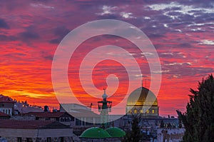 Bloody red sky above the Dome of the Rock in Jerusalem