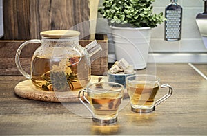 Blooming flowering tea in glass teapot