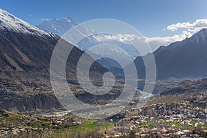 Blossom in Hunza valley with Rakaposhi background, Gilgit Baltistan, Pakistan