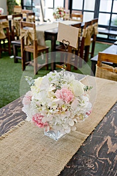 Blossom rose placed on the desk in dine room