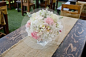 Blossom rose placed on the desk in dine room