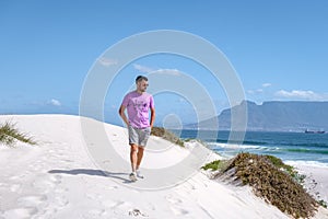 Bloubergstrand Cape Town South Africa on a bright summer day, Blouberg beach, withe sand and blue ocean
