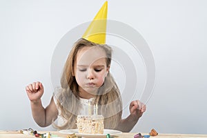 Blow out candles make a wish birthday child