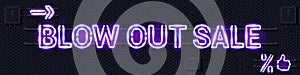 BLOW OUT SALE glowing purple neon lamp sign on a black electric wall