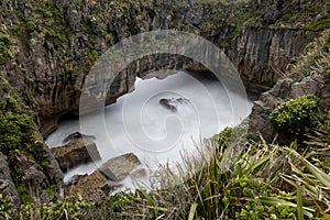 Blowhole view seen from the walktrack at Pancake rocks, New Zealand