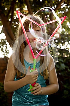 Blowing big bubbles photo