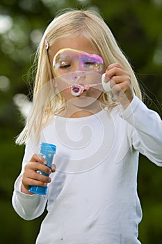 Blowing a giant soapbubble