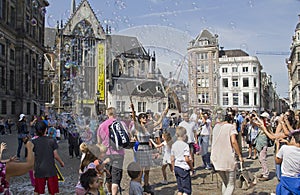 Blowing soap bubbles in Amsterdam
