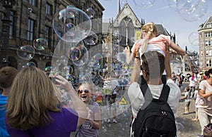 Blowing soap bubbles in Amsterdam