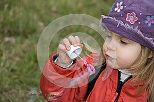 Blowing soap bubbles out