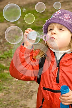 Blowing soap bubbles out