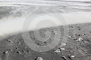 Blowing wind causes drift-sand at dutch Ameland Island photo