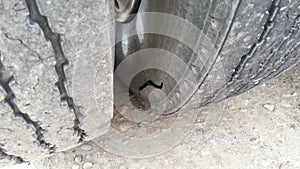 A blown sidewall on a truck tire photo