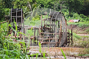 Blows irrigation, wood machinery that can divert water from low to high places without using oil. The wisdom of the local people photo