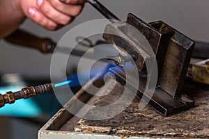 Blowtorch on Metal Mold at Goldsmith Workshop