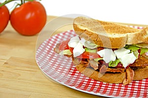 BLT sandwich with tomatoes photo