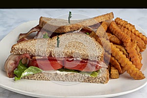 blt on wheat bread with sweet potato fries