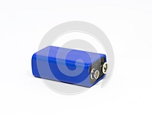 A blue 9 volt battery isolated on a white background