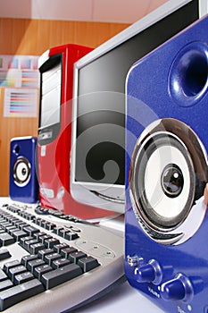 Blue acoustic systems with red computer