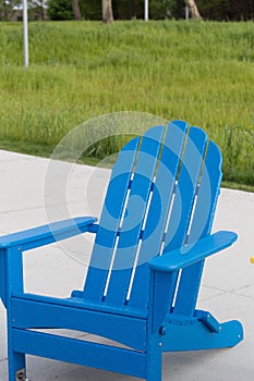 Blue Adirondack chair at the Euclid Beach in Cleveland, Ohio