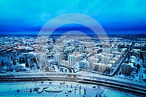 Blue aerial view of city of Tampere, Finland, in winter