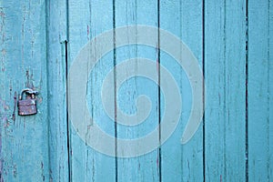 Blue aged paint wood door padlock security lock entrance background