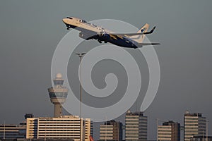 Blue Air airplane approaching the Amsterdam Schiphol Airport AMS