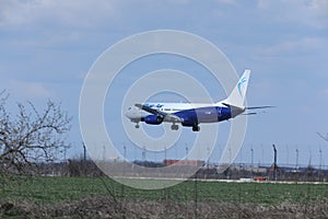 Blue Air Boeing 737-800 YR-BMF jet landing on runway