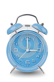 Blue alarm clock with the hands at 3 am or pm isolated on a white background