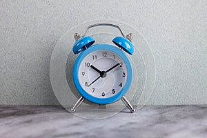Blue alarm clock retro style