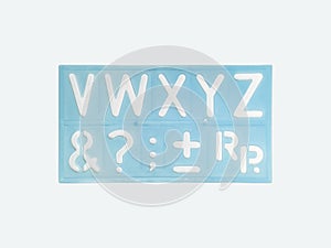 blue alphabet template ruler on white background. classic alphabet and number molding ruler