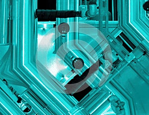 Blue aluminum background. Metal pipes and abstract technological components. industrial concept.