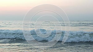 Blue and aquamarine color sea waves and yellow sand with white foam isolated on white background. Marine beach background.