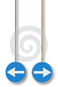 Blue arrow sign isolated on white background hanging from a rope