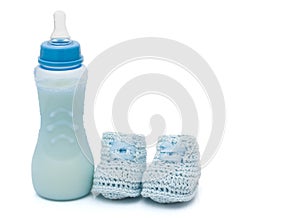 Blue Baby Booties and baby bottle