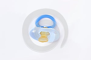 Blue baby pacifier isolated on white.