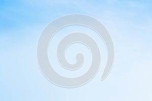 The blue backdrop has some clouds.