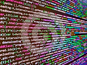 Blue background. Developer working on program codes in office. Javascript code. Source PC website developer. Coding, programming,