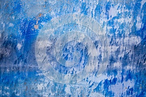 Blue background with ink texture on metal.