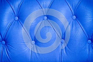 Background pattern of a chesterfield buttoned leather sofa