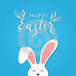 Blue background with text Happy Easter and rabbit ears