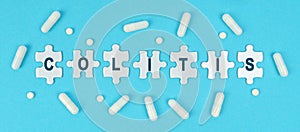 On a blue background, there are pills and puzzles with the inscription - COLITIS