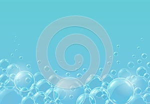 Blue background with transparent soap bubbles