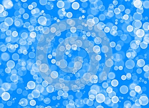 Bright white circles on a bright blue background.
