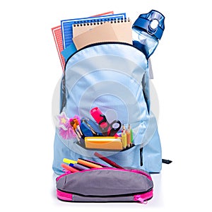 Blue backpack with school supplies